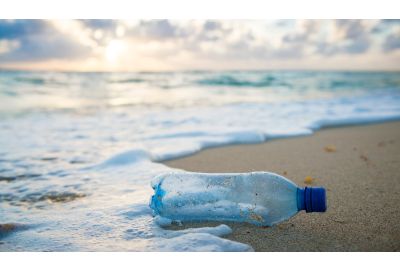 Water bottle washed up on a beach